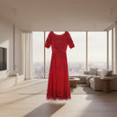 Red lace dress on a white background