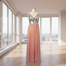 Long dress with sequined top and pink skirt on a mannequin against a white background