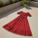 Red lace dress on a white background