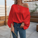 Women's off-shoulder satin blouse with an elegant asymmetric neckline