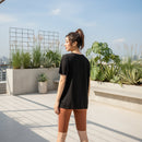 Women's off-shoulder satin blouse with an elegant asymmetric neckline