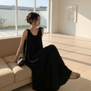 Women's sleeveless backless maxi tank dress with a flowing silhouette
