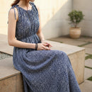 Women's sleeveless floral maxi dress with a flowing silhouette