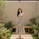 Women's strapless printed chiffon maxi dress with a flowing silhouette