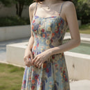 Women's strapless printed chiffon maxi dress with a flowing silhouette