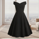 Black off-shoulder dress on a white background